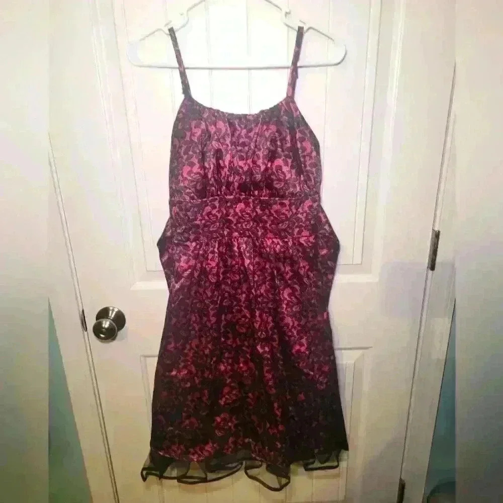 Y2k Taboo dress size 6 With adjustable straps, pull back belt, ruffled bottom.